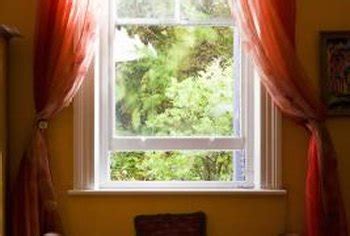 Mix 1 cup of vinegar with 4 cups of hot water and pour the mixture into a sprayer. How to Open Double Hung Windows for Cleaning | Home Guides ...