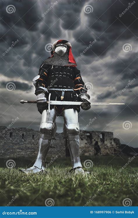 Medieval Knight Posing With Sword Stock Photo Image Of Metal Armed