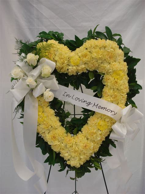 cream and white open heart, sympathy spray | Funeral floral