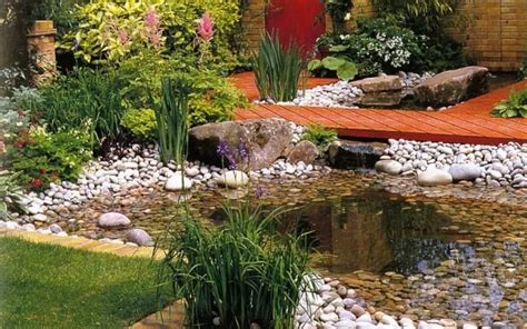 Make a scarecrow to scare off animals and birds from feasting on your garden, or use it for festive fall decor. Bog Garden With Pond And Rocks : Interesting And Unusual ...