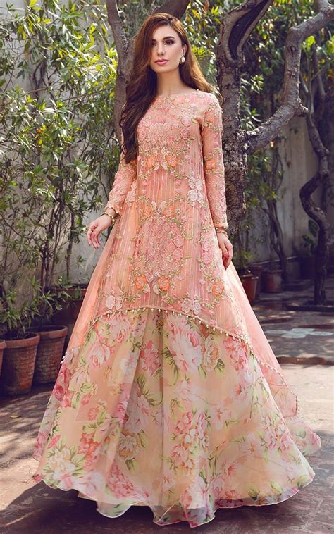 You can also describe the sarara dress as being a kind of loose, trailing pajama worn by women. Peach Floral Kurta Lehenga - Frugal2Fab | Mastani dress ...