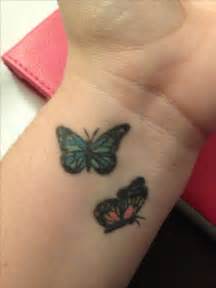 Metallic, glitter & glow available. Butterfly Wrist Tattoos Designs, Ideas and Meaning ...
