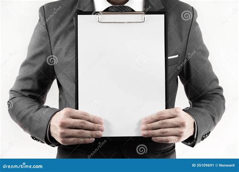 Business Man In Suit Holding A Blank Clipboard Stock Image Image Of
