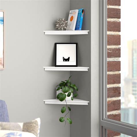 Inside, our wood trim is the perfect finishing touch. Red Barrel Studio® Triangle Corner Wall Shelf Set ...