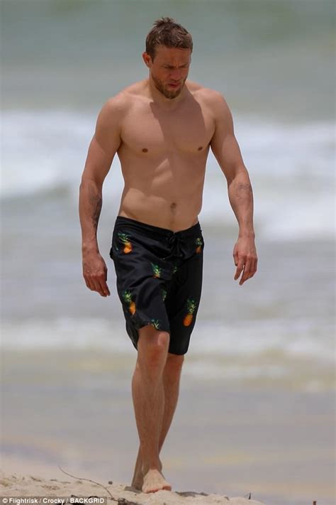 Charlie Hunnam Enjoys Beach Day With Mystery Woman Daily Mail Online