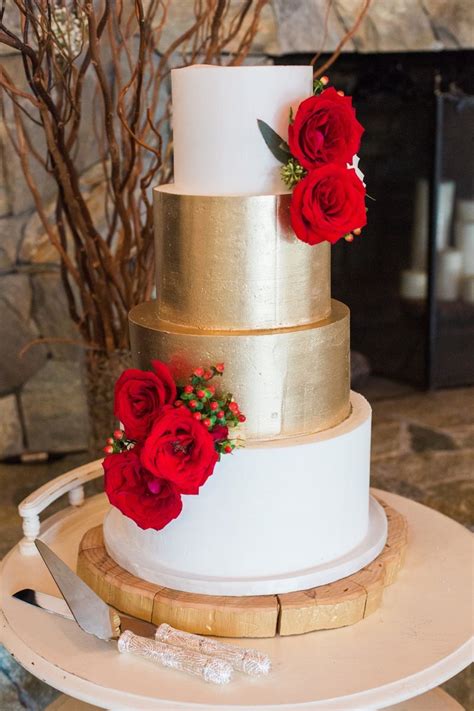 Use it as a main color through tablecloths and table overlays, or as an accent with napkins and table runners. Rustic Elegant Red and Gold Wedding | Wedding cake red, Gold wedding decorations, Floral wedding ...