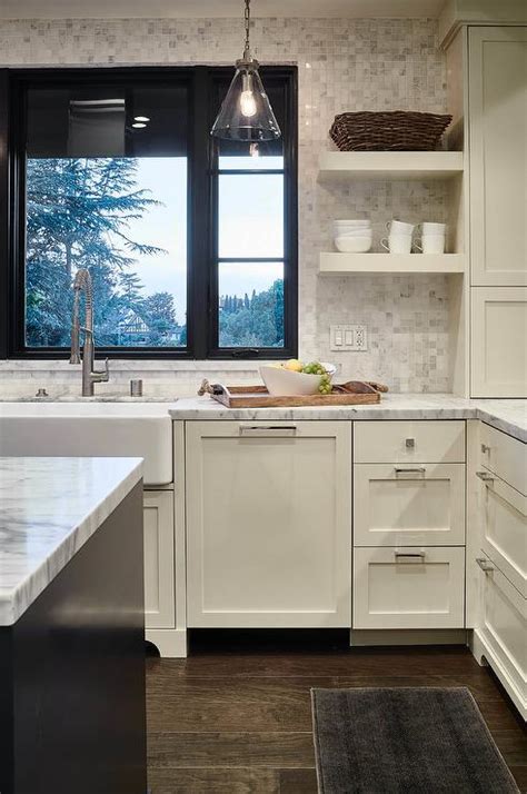 Practical drawers, cabinets and beautiful marble countertops are perfect for your daily kitchen tasks. Ivory Shaker Kitchen Cabinets with White Marble Grid Tile backsplash - Transitional - Kitchen