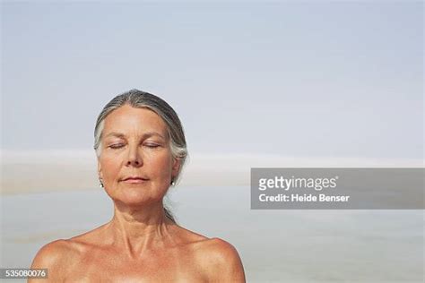 Beautiful Mature Woman Beach Photos And Premium High Res Pictures