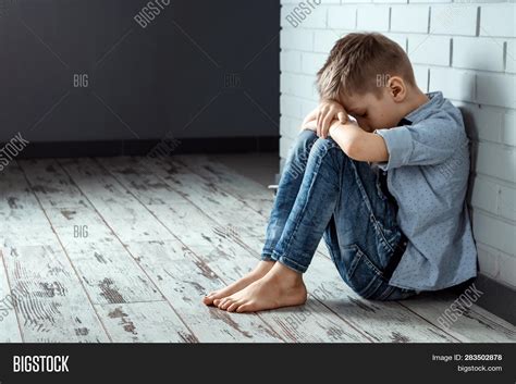 Young Boy Sits Alone Image And Photo Free Trial Bigstock