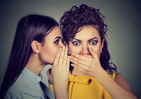 Shocked Woman Listening Gossip A Secret In The Ear Stock Photo Image
