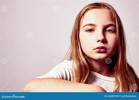 Portrait Of A Pretty Pensive Teenage Girl With Long Hair Pretty Woman