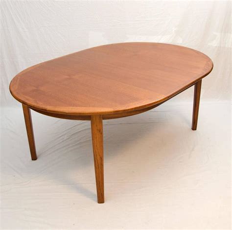 Splurge on a teak dining set to get the party started outdoors. Large Danish Teak Round Dining Table Four Skirted Leaves ...