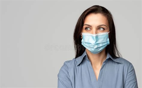 Woman In Surgical Mask Looking Away Stock Image Image Of Pestilence Risk 184971423