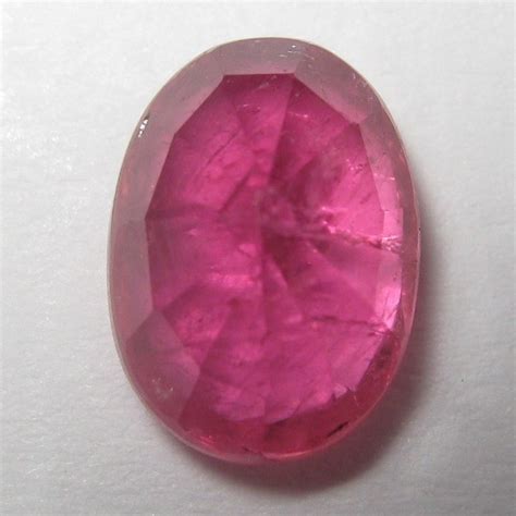 Batu Permata Natural Ruby Purplish Red Oval Cut 150 Carat