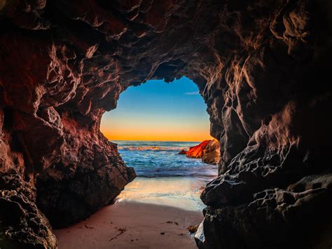 Malibu Sea Cave Sunset Red Orange Yellow Clouds Leo Carillo State Beach