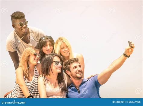 Group Of Multiracial Happy Friends Taking A Selfie Outdoors Stock Image Image Of African Afro