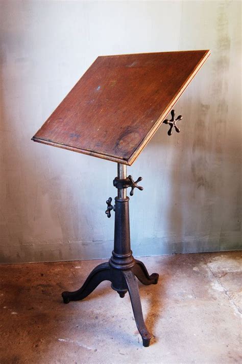 Our industrial drafting table is crafted from reclaimed wood, recycled iron and working industrial factory parts to to create eclectic pieces of furniture. Vintage Industrial Drafting Table with Cast Iron Base ...