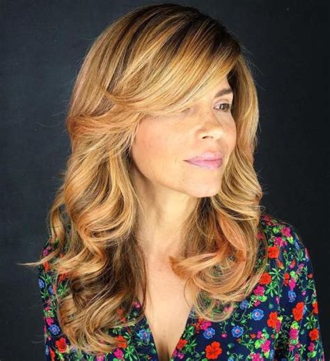 Creating an additional texture from the front of the hair to the beginning of the ear or eyebrow area creates the appearance that we call ''bangs''. 50 Cute Long Layered Haircuts with Bangs 2021