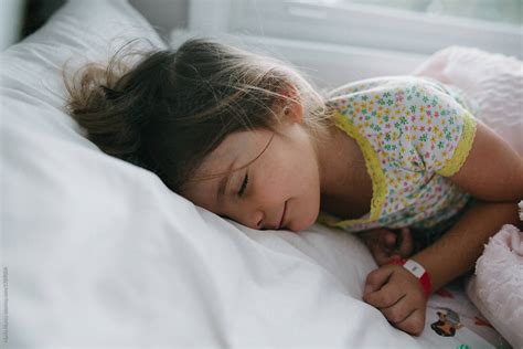 Young Girl Sleeping In Bed By Maria Manco