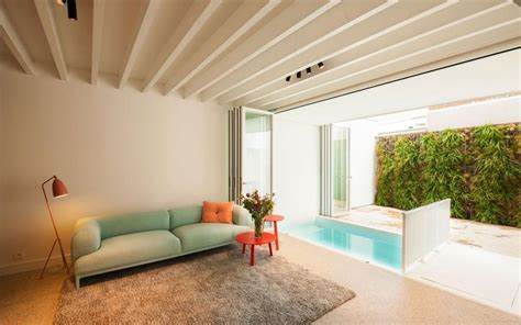 It may be four posts with a roof, which is also referred to as a pavilion, but qualifies as a cabana when adjacent to a swimming pool. Small Indoor Pool nested in a Tiny Minimalist Belgium ...
