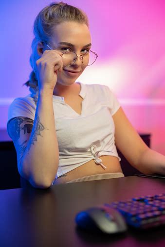 Professional Gamer Girl With Headset Play Online Multiplayer Video Game