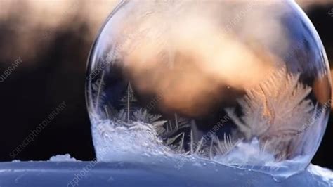 Ice Crystals Forming On A Soap Bubble Stock Video Clip K0067374