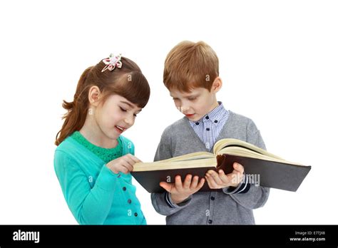 Boy And Girl Read Book Isolated On White Background Stock Photo Alamy