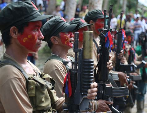 35 npa rebels surrender in north the manila times