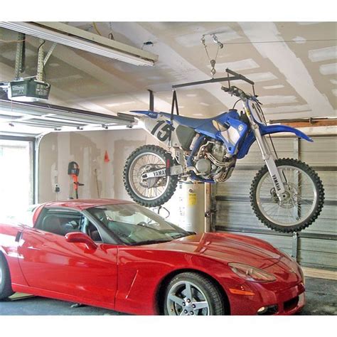 It should be spaced the distance from the end of back of seat rests on the bracket and the front bracket is under the handle bars. Bicycle Lifts For Garage - Wally Liftmate Garage Bike Lift / Bike lane bicycle storage lift bike ...