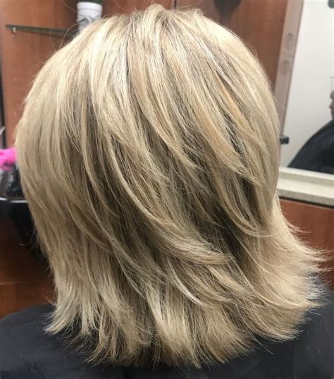Thick Feathered Blonde Lob Medium Shag Haircuts Medium Shaggy