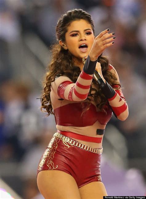 Selena Gomez Wears Red Leather Bodysuit At Thanksgiving Day Halftime