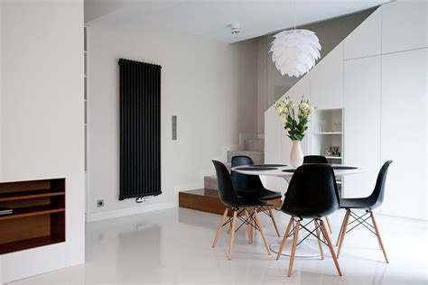 The 42 square counter dining table features a faux marble top in a beautiful white and gray pattern that is set off by the black solid wood table frame. 25 Gorgeous Dining Rooms to Make You Drool