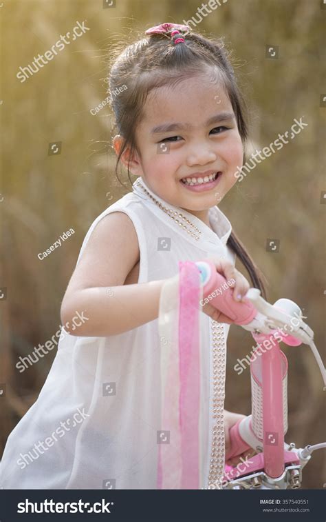 Happy Asian Girl Child Raising Hands Stock Photo 357540551 Shutterstock
