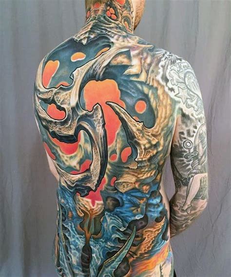 The rebellious or those with dark sides often choose this form of inking. 40 Badass Back Tattoos For Men - Masculine Design Ideas