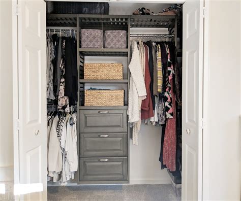 An Organized Closet With Clothes Baskets And Other Items In Its