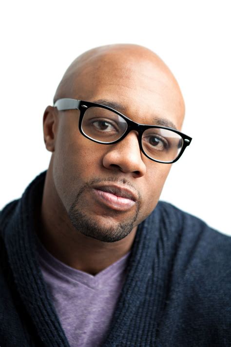 Stylish African American Man Wearing Black Framed Glasses Shallow