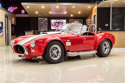 This superformance cobra is sporting a glossy silver paint. 1965 Shelby Cobra | Classic Cars for Sale Michigan: Muscle ...