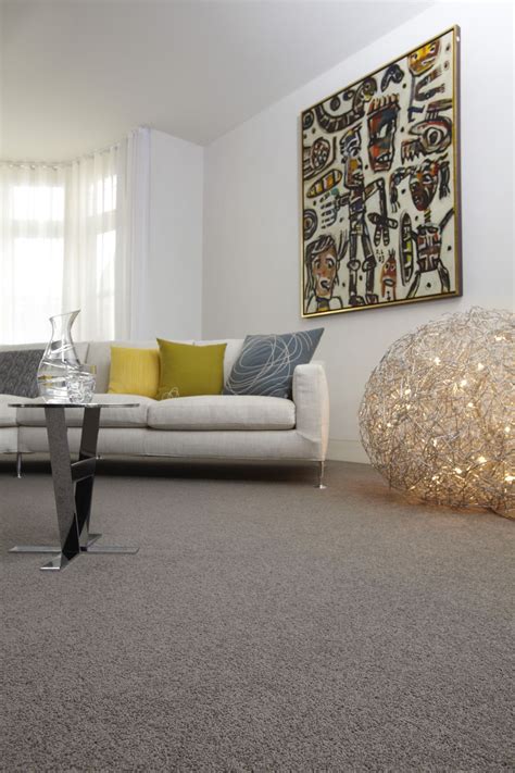 Grey Wool Carpet Creates A Good Base For Bright Accessories In This
