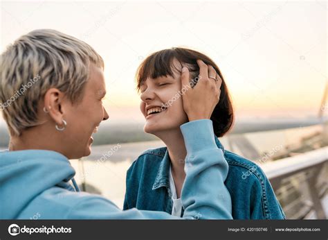 Close Up Of Young Sensual Lesbian Couple Laughing Enjoying Romantic Moments While Standing On