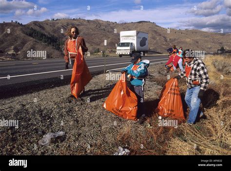 Adopt A Highway Volunteers Pick Up Litter Stock Photo Alamy