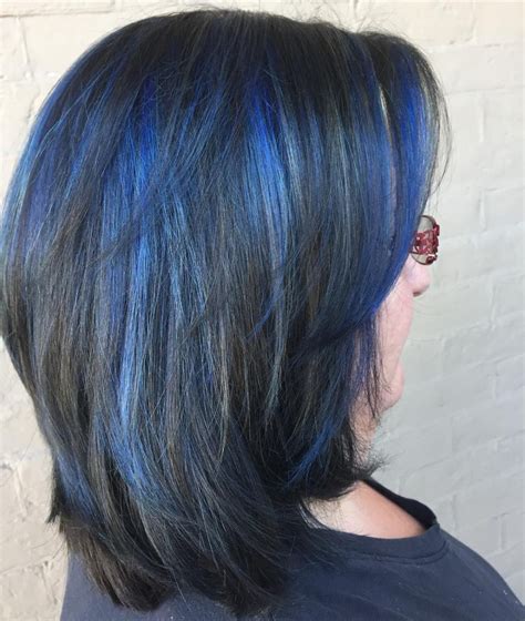 This hue flourishes the endings of the damaged hair and gives a volume look to them. 19 Most Amazing Blue Black Hair Color Looks of 2019