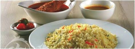 Fragrant and tasty nasi biryani/briyani flavored with spices and rose or kewra water. Restoran Melayu (Malay restaurant) Resepi JM Beriani Sedap ...