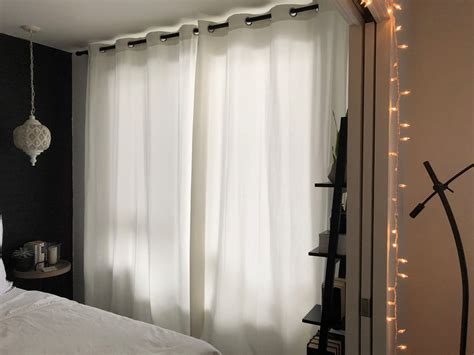 How To Hang Curtains To Make Your Ceiling Look Taller