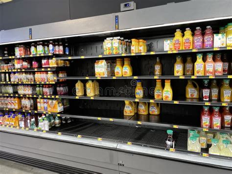 Walmart Retail Grocery Store Interior Blown Out Orange Juice Section