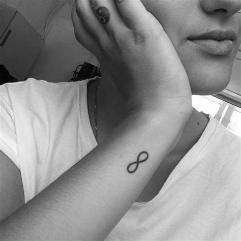 Infinity Symbol Tattoo On Nihads Wrist