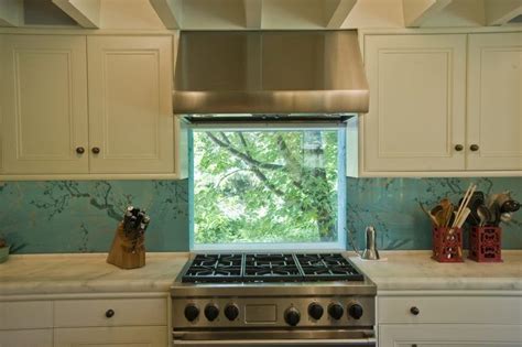 You can place your hand on an induction stove top without getting burned because your hand isn't a good conductor of electricity. 2 window behind the stove ideas (2) | Kitchen cooktop ...