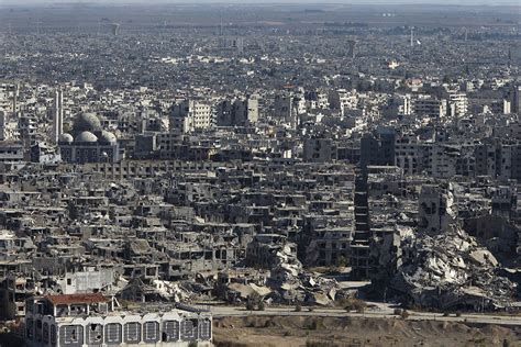 Syria Shattered City Of Homs Returns To Assad Control As Fighters