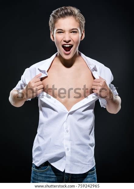 Photo Guy Age Teenager Tearing Shirt Stock Photo 759242965 Shutterstock