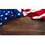 Old American Flag On Wooden Plank Background