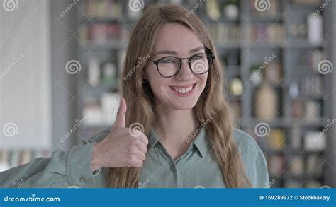 The Portrait Of Cheerful Woman Showing Thumbs Up Stock Photo Image Of